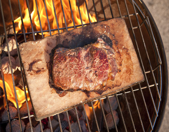 American beef steak grilled on Himalayan BBQ salt plank